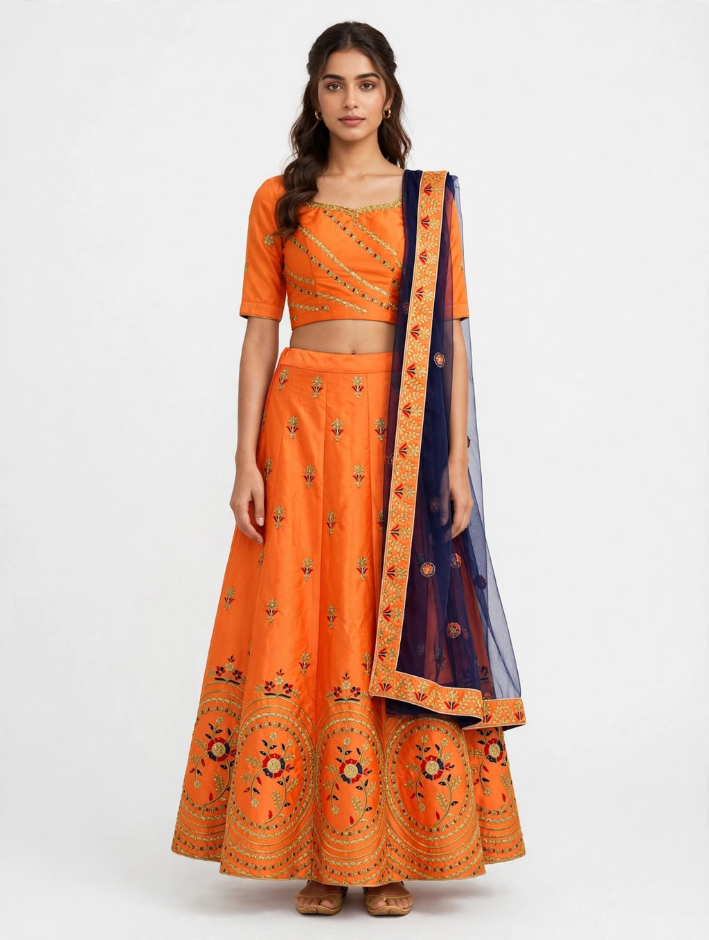 Lehenga in Vivid Peach with Gold Zari Embroidery
