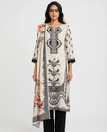 An ivory kurti with bright floral dupatta
