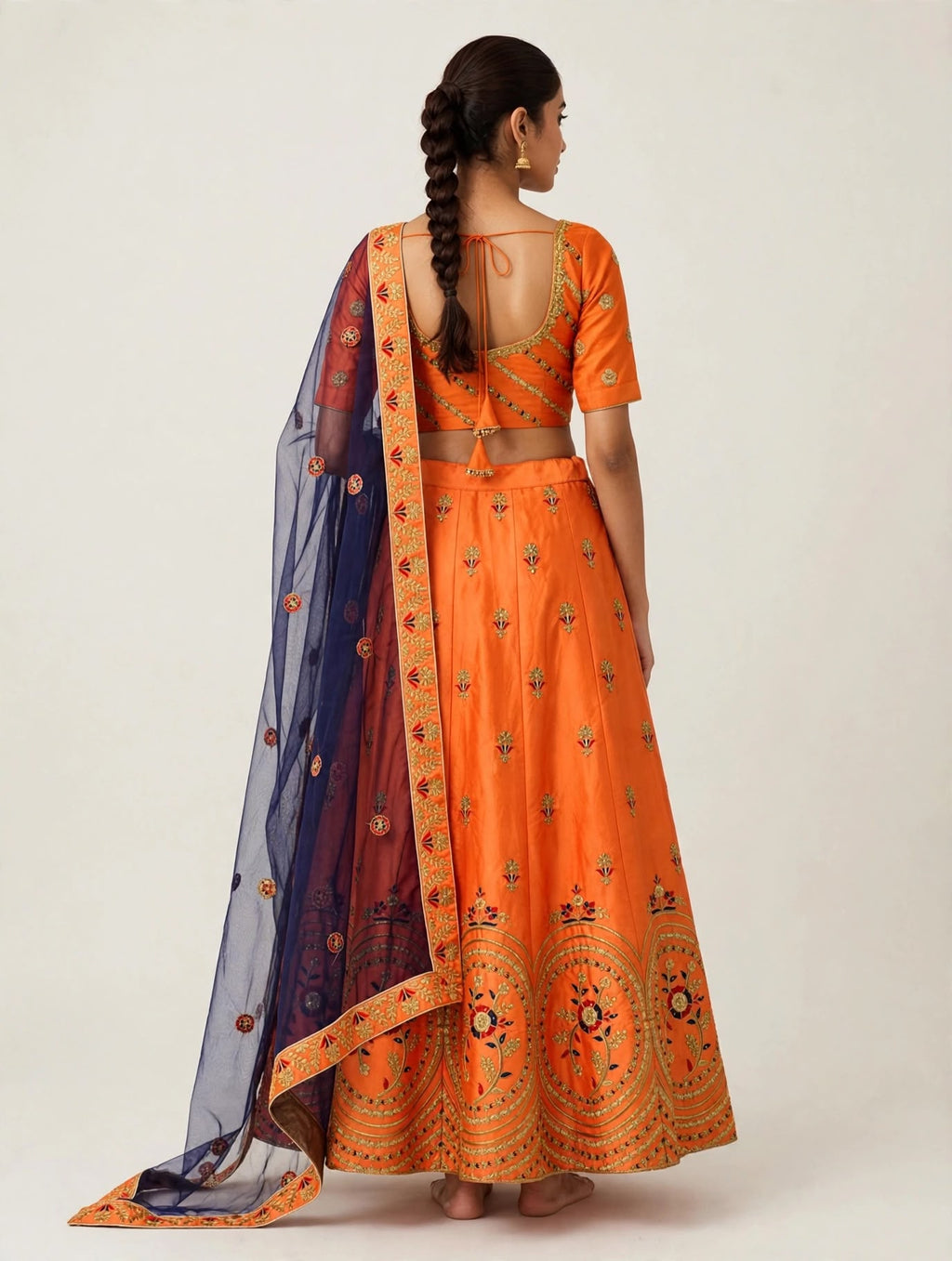 Lehenga in Vivid Peach with Gold Zari Embroidery