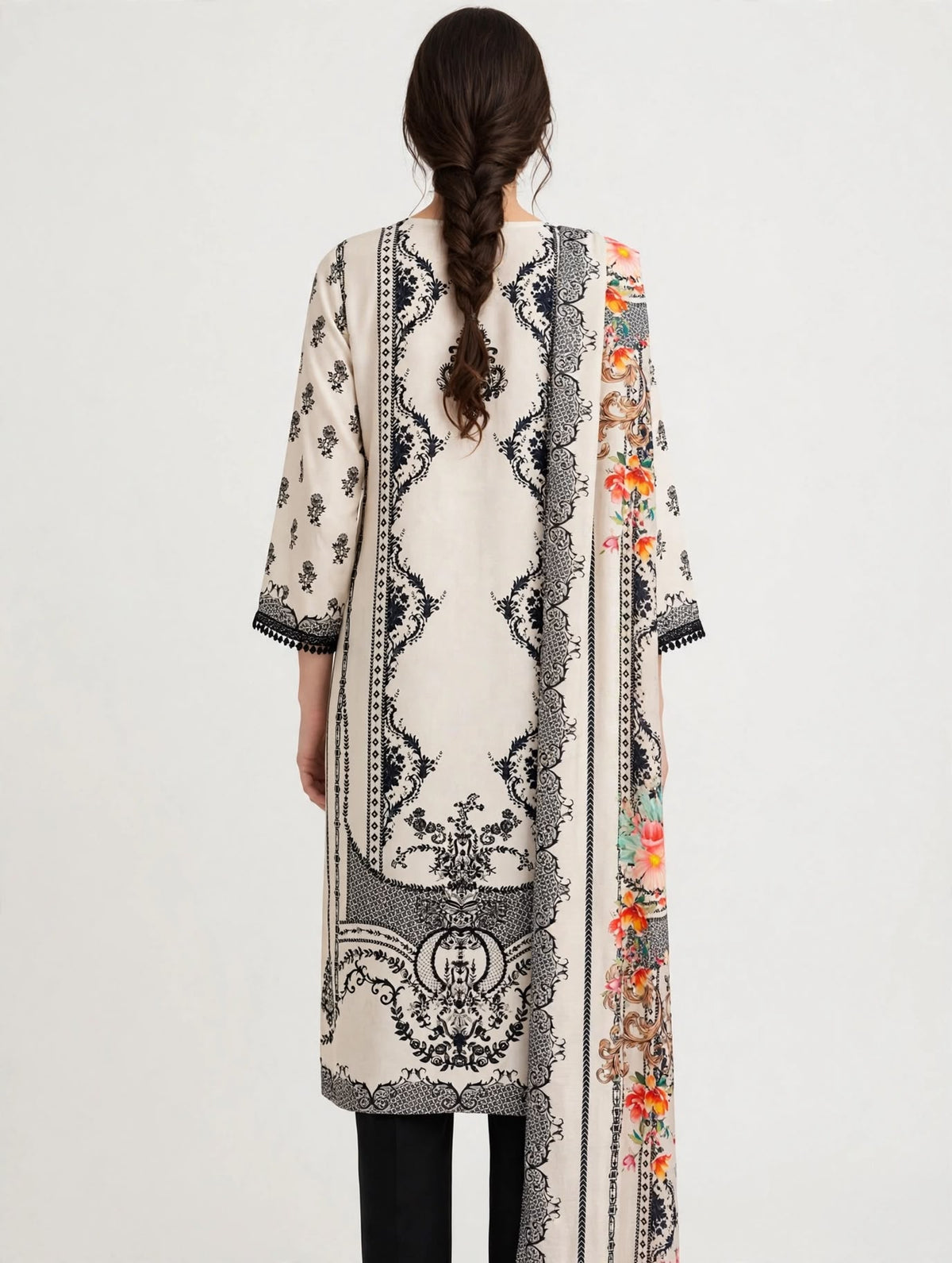 An ivory kurti with bright floral dupatta
